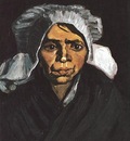 head of a peasant woman with white cap version