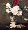 peonies in a vase on a stand