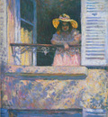 young girl in a window