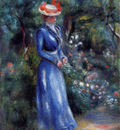 woman in a blue dress standing in the garden of saint cloud