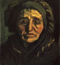 head of a peasant woman with a greenish lace cap