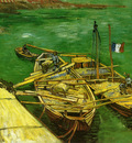 quay with men unloading sand barges